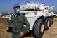 An Italian UN peacekeeper soldier stands guard at a road that links to a United Nations Interim Force In Lebanon, or UNIFIL base, in Naqoura town, Lebanon, on May 4, 2021