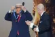 President Donald Trump is presented with the inaugural FIFA Peace Prize by FIFA President Gianni Infantino during the 2026 FIFA World Cup draw at the Kennedy Center, December 5, 2025, in Washington