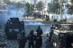 Police officers fire tear gas shell to disperse Shiite Muslims during a protest to condemn the killing of Iranian Supreme Leader Ayatollah Ali Khamenei, in Karachi, Pakistan, March 1, 2026