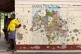 Students line up outside a classroom with a map of Africa on its wall, in Yei, in southern South Sudan, November 15, 2016
