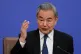 Chinese Foreign Minister Wang Yi speaks during a press conference on the sideline of the National People's Congress (NPC) at the media centre, in Beijing, Sunday, March 8, 2026
