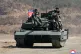 North Korean leader Kim Jong Un (front right), his daughter, reportedly named Kim Ju Ae, and other soldiers on a tank at a military training base in North Korea, March 19, 2026