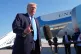 US President Donald Trump speaks with the media before boarding Air Force One at Palm Beach International Airport, Florida, March 23, 2026