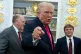 President Donald Trump speaks with reporters during the swearing in ceremony for Homeland Security Secretary Markwayne Mullin in the Oval Office of the White House, March 24, 2026, in Washington