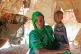 Nurto Madey, a mother displaced by drought, holds her daughter inside her makeshift hut at Ladan internally displaced persons camp in Dolow, southern Somalia, March 25, 2026