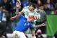 Italy's Matteo Politano, bottom, and Northern Ireland's Brodie Spencer vie for the ball during the World Cup qualifying play-off soccer match between Italy and Northern Ireland, in Bergamo, Italy, March 26, 2026