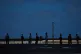People wait to take public transportation during a blackout in Havana, March 4, 2026