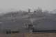 A North Korean military guard post, top, and a South Korean post, bottom, are seen from Paju, South Korea, near the border with North Korea, February 26, 2026