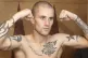 Ricky Burns gestures during the weigh in ahead of their Commonwealth Super-Featherweight Champion fight at the Thistle Hotel, Glasgow, June 2009