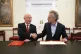 Defence Secretary John Healey (left) and the CEO of software company Palantir Technologies Alex Karp sign a £1.5 billion investment, September 18, 2025