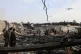 Residents and volunteers inspect the site of a late-Monday airstrike at a drug rehabilitation hospital in Kabul, Afghanistan, March 17, 2026