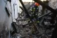 A rescue worker walks inside apartments destroyed by a Russian strike in Odesa, Ukraine, April 27, 2026