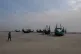 Fishing boats sit on a beach in Teknaf, Bangladesh, on March 9, 2023