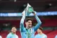 Manchester City's John Stones with the trophy after winning the Cup Final at Wembley Stadium, London, March 22, 2026