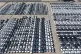 An aerial view of new cars awaiting export to oversea markets is seen at a port in Shanghai, March 10, 2026