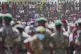 Mourners gather to view the caskets of the 16 girls who died in the Utumishi Academy school fire during a memorial service at Gilgil Stadium, Nakuru County, Kenya, June 12, 2026
