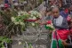 Kenyan activist Boniface Mwangi places a flower during a memorial demonstration to mark two years since more than 60 people died in anti-government demonstrations that resulted in the storming of the parliament, in Nairobi, Kenya, June 25, 2026