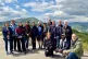 The North West Trade Union International Committee group in the Monte Sole area south of Bologna with Italian guides Valentina Catone and Andrea Marchi (third and fourth from left) and Juri Guidi (kneeling, right)