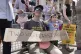People take part in Britain's first ‘DadStrike’, a demonstration organised by The Dad Shift, where hundreds of fathers gather at the picket line outside the Department for Business and Trade in London, to raise awareness of paternity rights, June 11, 2025