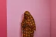 A woman who said she was abducted and sexually assaulted by the Rapid Support Forces, or RSF, before paying a ransom, poses for a portrait after an interview with The Associated Press in Omdurman, on the outskirts of Khartoum, April 25, 2026