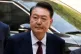South Korea's ousted former President Yoon Suk Yeol arrives to attend his trial at the Seoul Central District Court in Seoul, South Korea, May 12, 2025