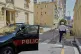 A police officer guards in a street in Monaco, Tuesday, June 30, 2026, a day after an explosive device seriously injured three people at a residential building in Monaco
