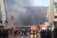 In this photo released by Xinhua News Agency, firefighters at the scene of a shoe factory fire in Jiangtou village, near Jinjiang city, Fujian province, China, July 9, 2026