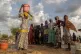 Women and children fetch water at dusk in the Korsi Refugee Camp in Birao, the Central African Republic, March 27, 2026