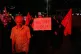 An Iranian pro-government demonstrator holds an anti-Trump placard in a gathering commemorating the late Iranian Supreme Leader Ayatollah Ali Khamenei at a square in Tehran, Iran, Saturday, July 11, 2026