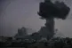 Smoke rises to the sky following an Israeli military strike in Maghazi refugee camp, in the central Gaza Strip