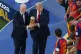 FIFA President Gianni Infantino and President Donald J. Trump present the trophy to Spain's Rodri (16) after the World Cup final soccer match between Spain and Argentina in East Rutherford, N.J., near New York, Sunday, July 19, 2026