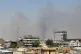 Black smoke rises following explosions near a military base hosting US forces in the northern Iraqi city of Irbil, July 24, 2026