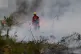Firefighters battle a wildfire near Marcheprime, outside, Bordeaux, France, July 26, 2026