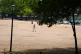 A person walks across the dry grass in Hyde Park in London. More sweltering temperatures are forecast for southern and eastern parts of England on Tuesday after highs of more than 33C rounded off June, July 1, 2025