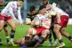 Scarlets' Fletcher Anderson is tackled during the Investec Champions Cup match at cinch Stadium at Franklin's Gardens, Northampton. Picture date: Sunday January 18, 2026
