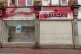 A Barclays bank branch covered in red spray paint in Burnley, Lancashire, August 5, 2024