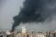 Smoke rises after Saudi-led airstrikes hit a food factory in