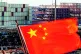 Tensions: A Chinese flag flies over a ship delivering goods 