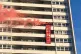 A YCL banner hangs from one of the occupied tower blocks