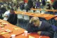 A lone diner waits to b served at a dinner for the homeless