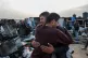 ANGUISH:  Palestinians weep amid the destruction after an Is