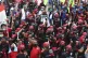 Labour demonstrators shout slogans during a protest against 