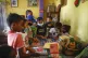 Children look at books donated by the Venezuelan charity, 