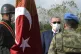 Turkey's President Recep Tayyip Erdogan wearing a mask to he