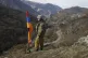 An ethnic Armenian soldier stands guard next to Nagorno-Kara
