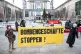 Participants in the day of action stand in front of the Fede