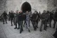 Israeli police arrest a Palestinian for protesting against D