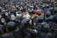 People clash with police during a protest against the jailin