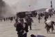 People run following an explosion at the airport in Aden, Ye