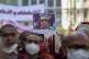 Buddhist monks display a defaced image of Myanmar military C
